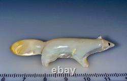 Fétiche en coquille de MOP à lèvres dorées zuni par David Tsikewa (d.)