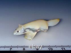 Fétiche en coquille de MOP à lèvres dorées zuni par David Tsikewa (d.)