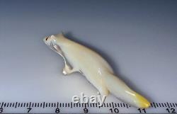 Fétiche en coquille de MOP à lèvres dorées zuni par David Tsikewa (d.)