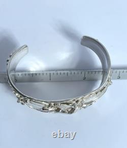 Gros bracelet jonc en argent sterling avec aigle Navajo Allen Chee, fin 20e début 21e siècle
