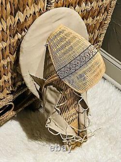 Planche berceau faite à la main du peuple amérindien Paiute du Sud, début du XIXe siècle.