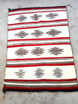 Tapis réversible en géométrique Thunderbird fait main Navajo ancien 48 x 34