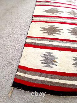Tapis réversible en géométrique Thunderbird fait main Navajo ancien 48 x 34